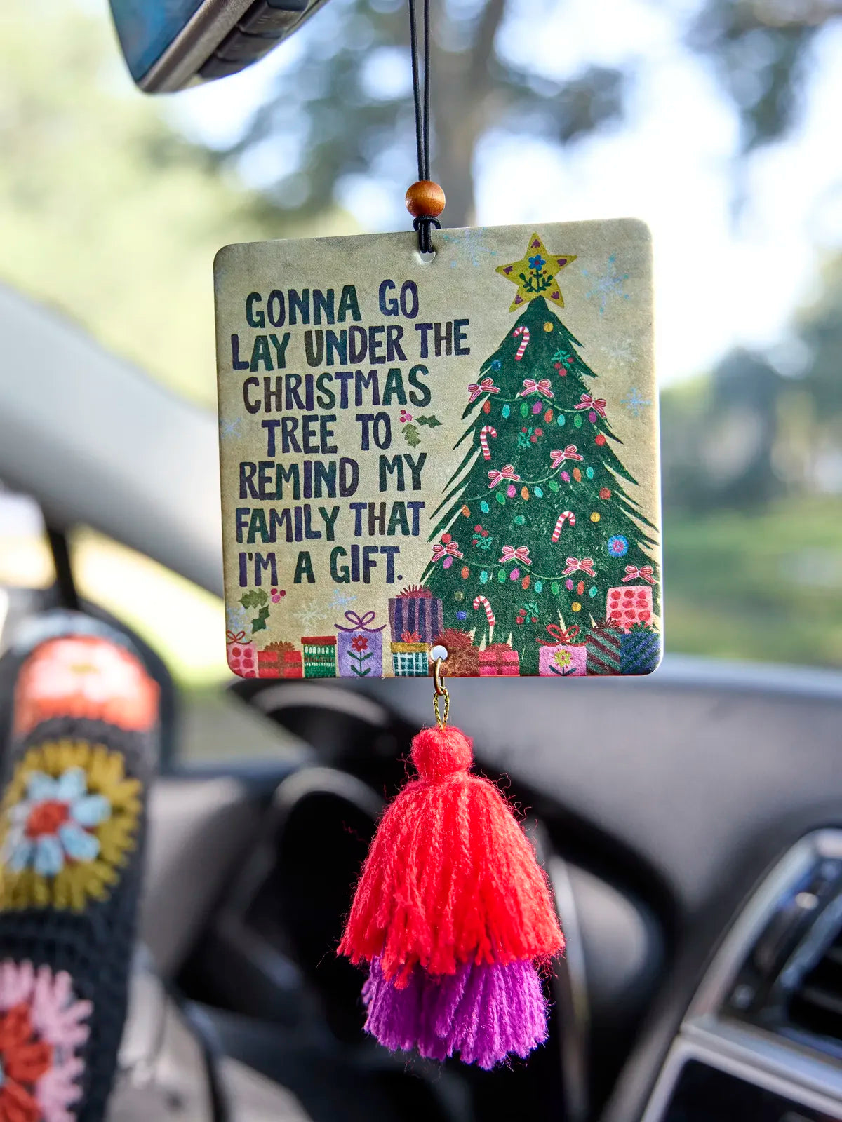 CHRISTMAS TREE AIR FRESHENER HANGING FROM REAR VIEW MIRROR