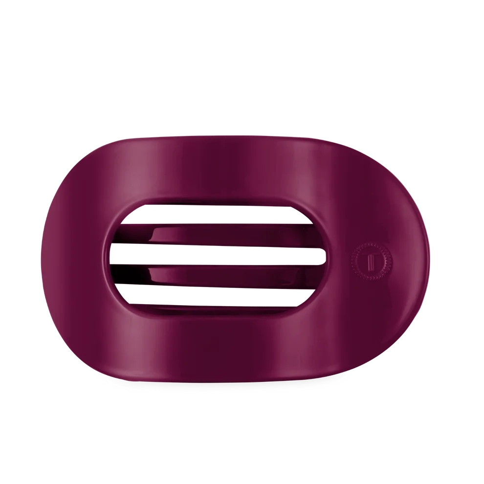 MULBERRY HIAR CLIP ON BLACK BACKGROUND