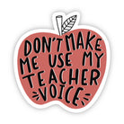 Pink apple-shaped sticker with text 'Don't make me use my teacher voice' on a white background