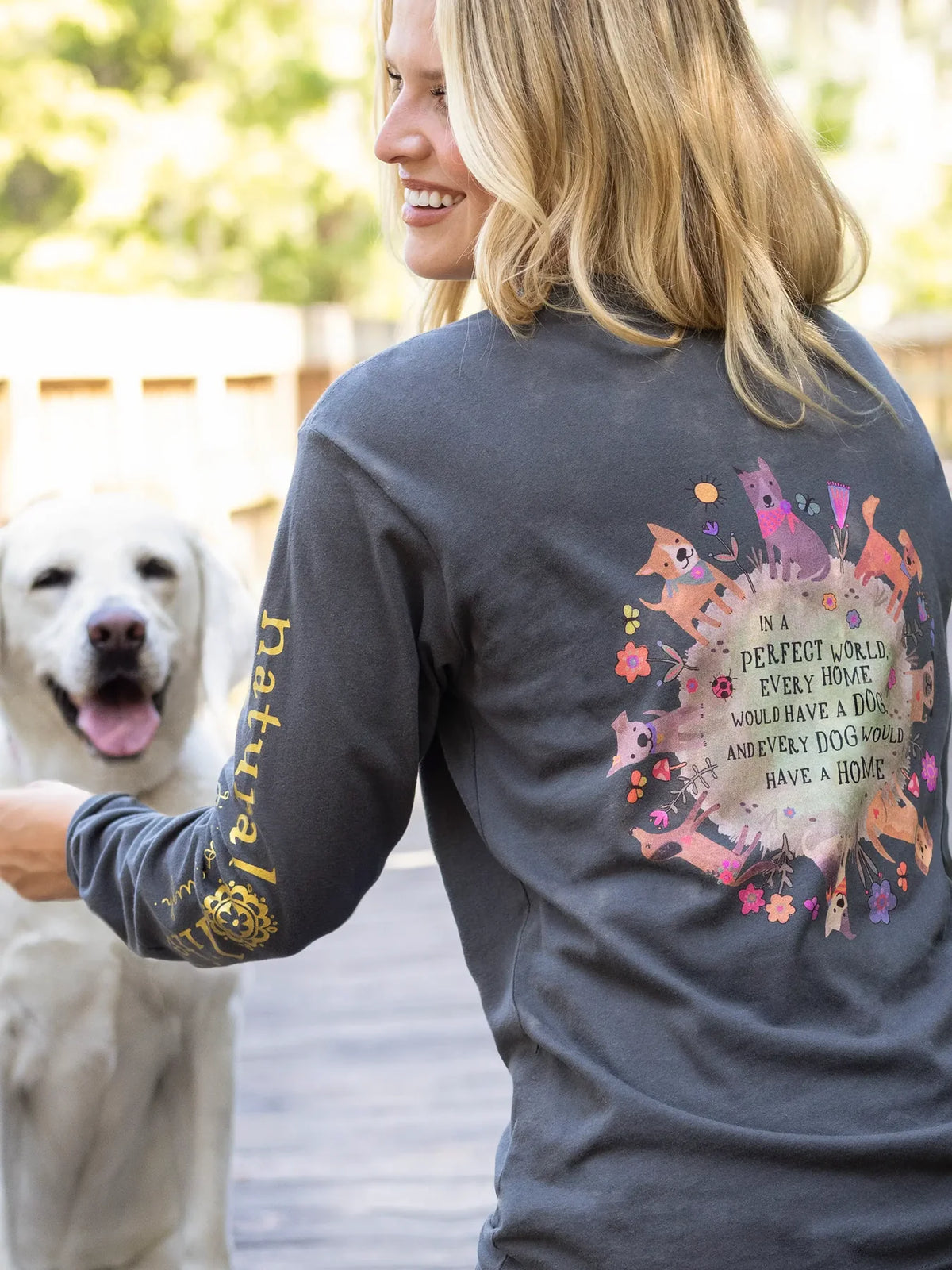 GIRL WEARING A GREY LONG SLEEVE TSHIRT WITH A DOG