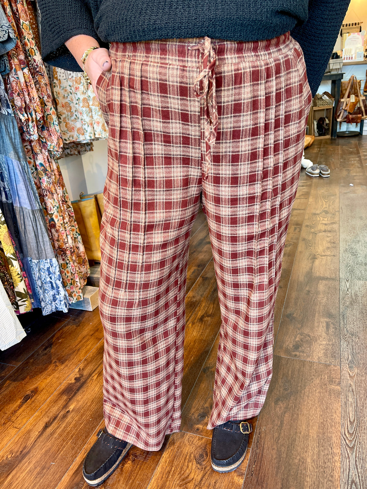 WOMAN IN PLAID PANTS