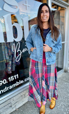 WOMAN WEARING PLAID MIDI SKIRT