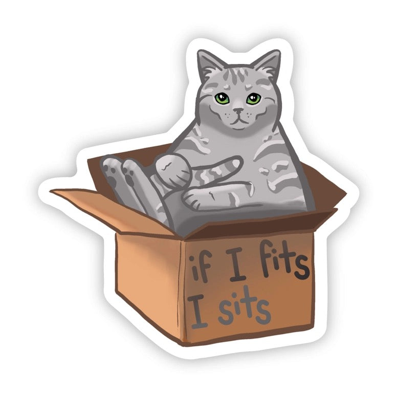 Sticker of a cat sitting inside a box with 'if I fits I sits' text on a white background