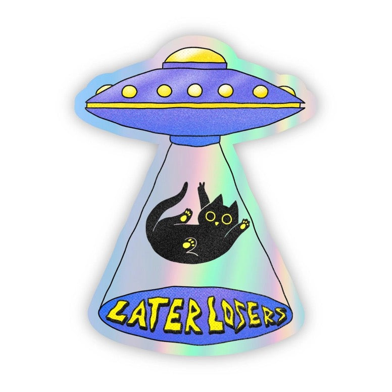 A die-cut sticker featuring a retro purple UFO with a black cat inside its beam of light, with the text 'CATER LOSERS' in yellow on the base. The sticker has an iridescent holographic border and is shown on a plain white background.