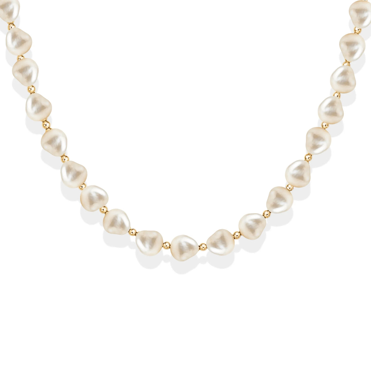 PEARL AND GOLD BEADED NECKLACE ON WHITE BACKGROUND