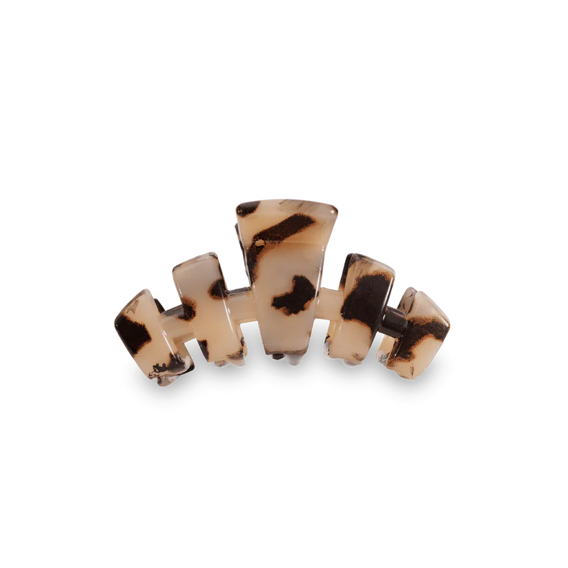 Tortoiseshell hair clip on a white background